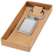 Sergio rechteckiger Schlüsselanhänger aus Metall in Geschenkbox von Signalshop.de, individuell gestaltbar, ideal als Werbeartikel, Werbegeschenk, Werbemittel oder Giveaway.