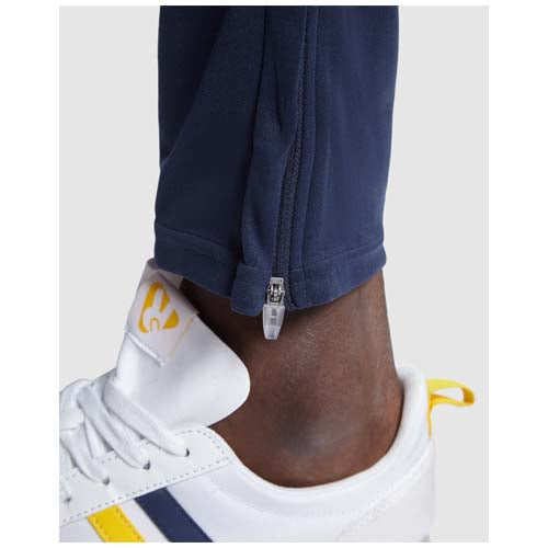 Neapolis Unisex Sporthose in Blau mit Reißverschluss, individuell gestaltbar mit Logo, erhältlich bei Signalshop.de für Werbeartikel und Giveaways.