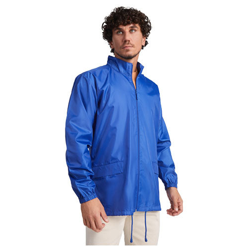 Blaue Escocia Unisex Regenjacke von Roly, individuell bedruckbar mit Logo, erhältlich bei Signalshop.de. Werbeartikel.