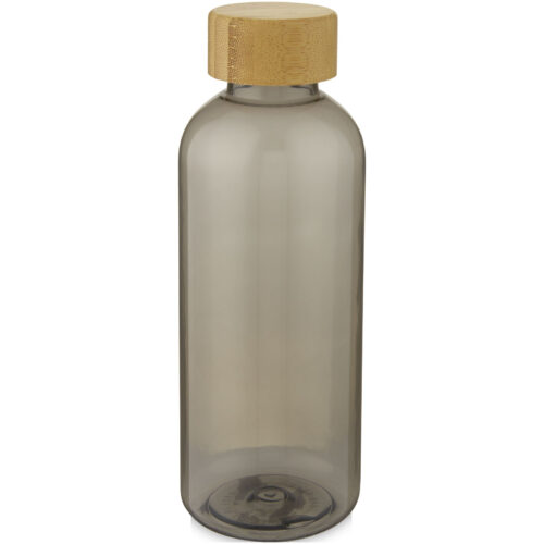 Graue Glasflasche mit Holzverschluss vor weißem Hintergrund.