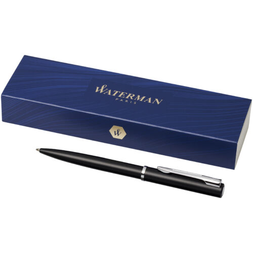 Ein schwarzer Waterman-Stift liegt neben seiner blauen Kartonverpackung mit goldener Schrift.